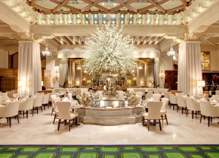 High tea is served in the Palm Court room of the Drake Hotel, one of our favorite family friendly restaurants in Chicago.