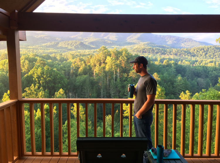 Enjoying morning coffee at our cabin near Great Smoky Mountains National Park.