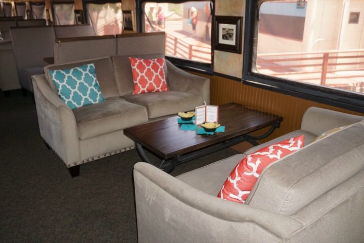 The comfortable couches and big picture windows make the train ride on the Verde Canyon Railroad very family friendly. Photo by Multidimensional SheBuysTravel, Kristi Mehes.