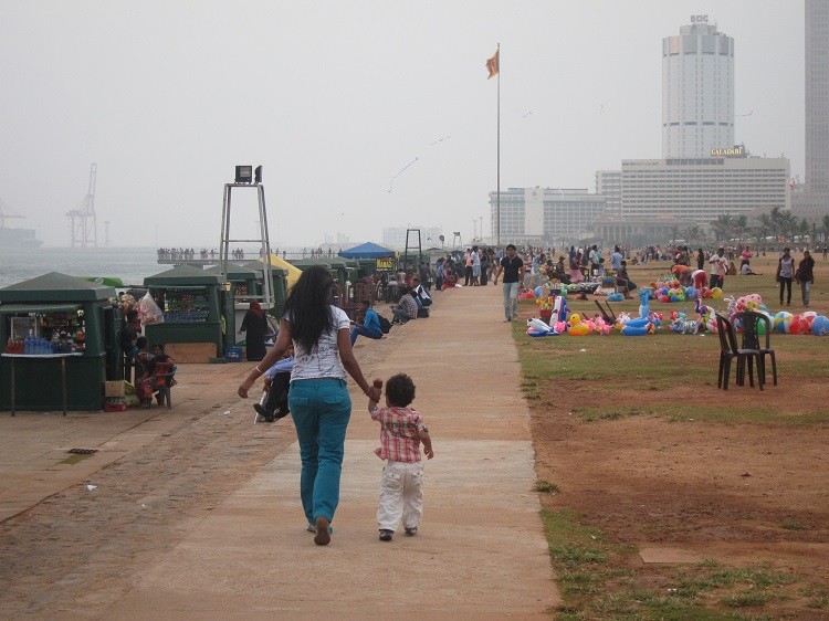 Mother and child enjoy a promenade when visiting Colombo Sri Lanka with kids.