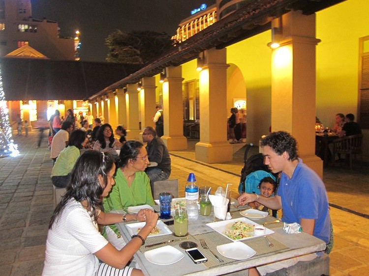Outdoor family dining at Dutch Hospital, one of the 5 best things to do when visiting Colombo Sri Lanka with kids.