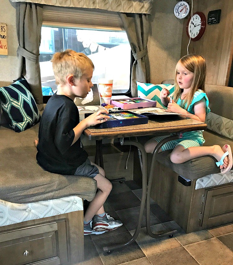 Game time is special time during a family travel trailer camping trip.