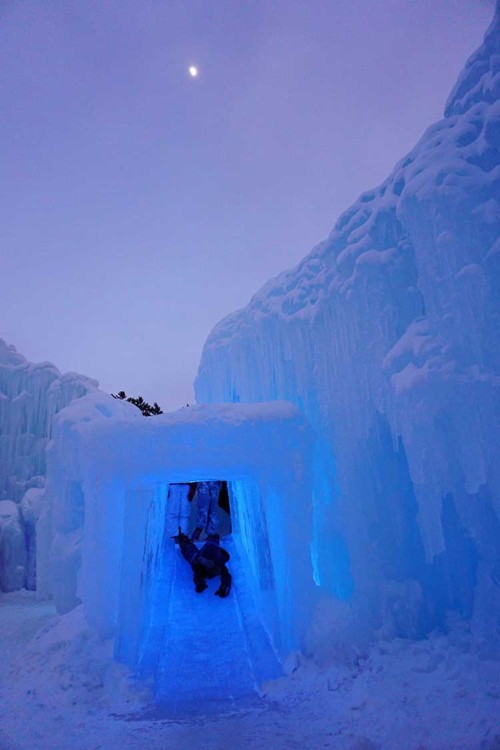 Visiting Ice Castles with kids at sunset at Dillon Ice Castles.