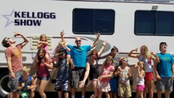 RV traveling family of 14 in front of their RV