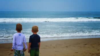 Two boys on the beach during a San Diego family vacation