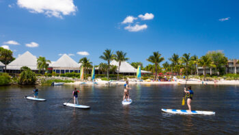 Paddleboarders at Club Med Sandpiper, an all inclusive resort in Florida